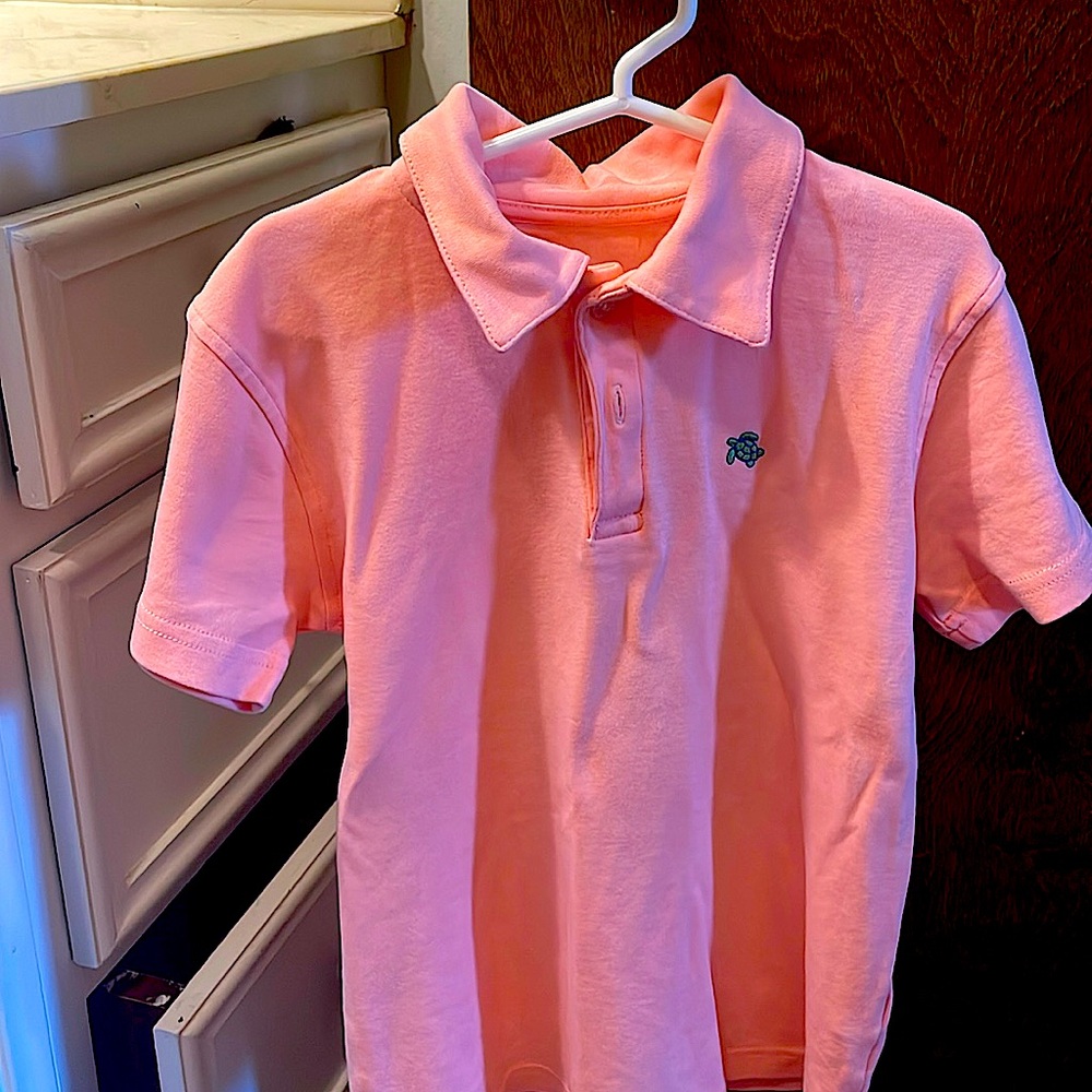 Boys’ J. Bailey polo shirt in peach/coral color